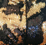 Mermaid color-changing sequin shorts by local New Orleans artist Jill Lindsay in black & gold