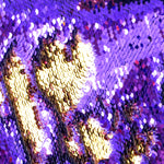 Mermaid color-changing sequin shorts by local New Orleans artist Jill Lindsay in purple and gold