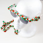 tri color (green, red, white) braided sunnies by stella g on a white foam head display