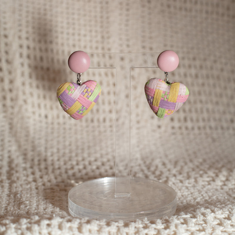 Studio Joy earrings in the shape of a heart.