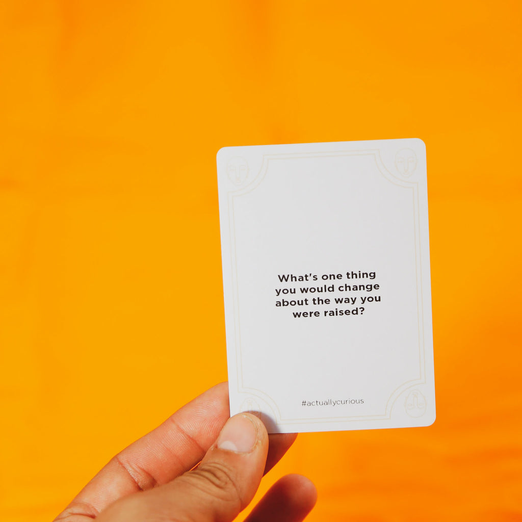 Actually curios card with question "what is one things you would change about the way you were raised?"